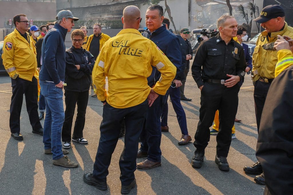 Fire officials and Elected local, State, and Federal representatives meet in the Palisades.