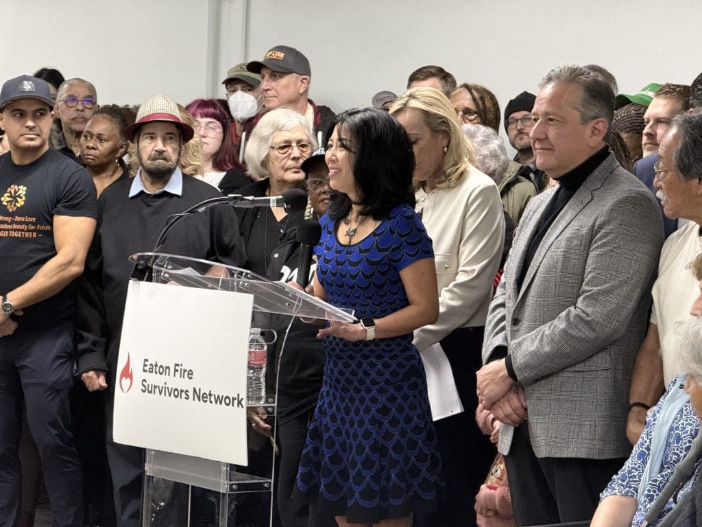 Joy Chen of the "Every Fire Survivor's Network" speaks at the one-year Altadena fire anniversary.